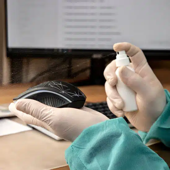 expert cleaning the mouse of computer